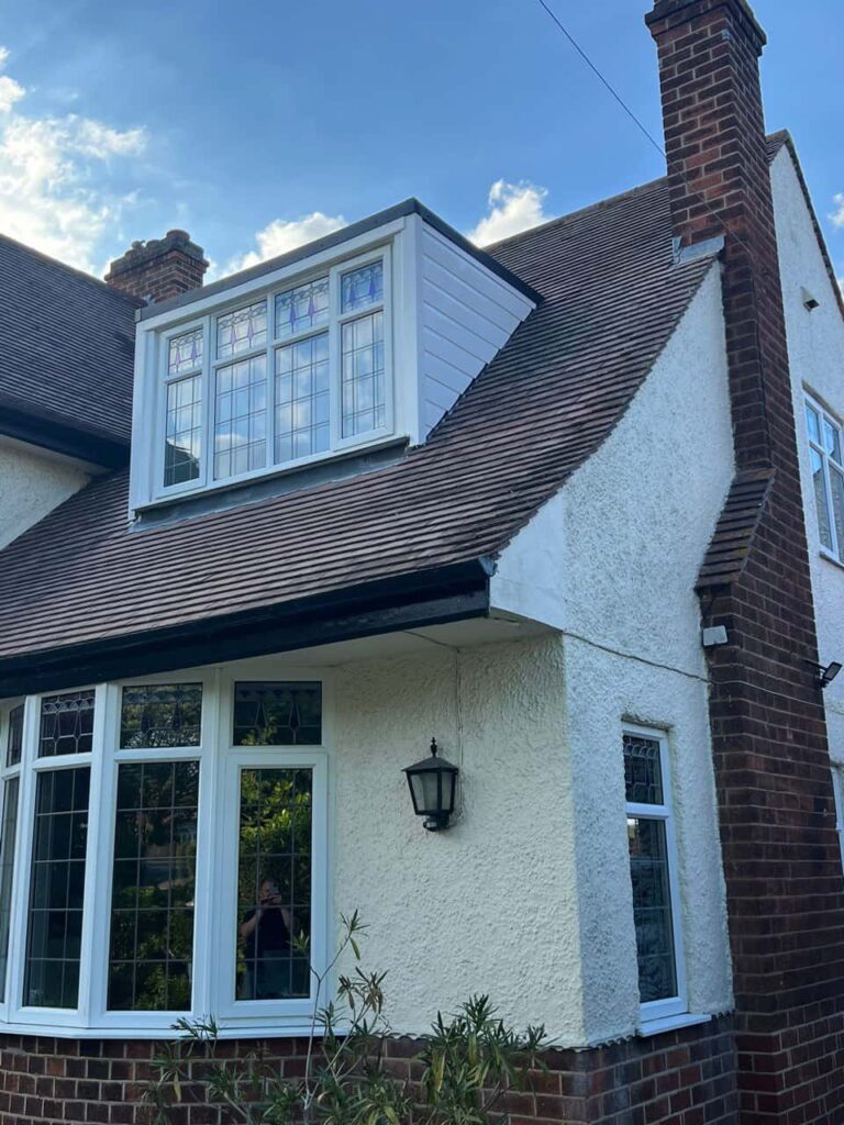 This is a photo of a dormer window which has just had some repairs carried out where the roof and the dormer meet. Works carried out by Alfreton Roofing Repairs